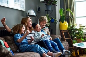 a group of people sitting on a couch