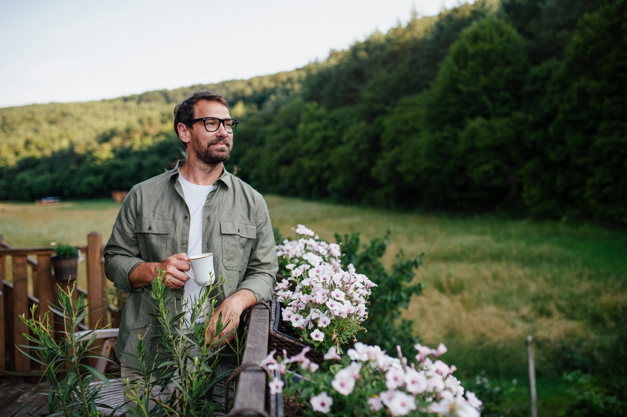 Man looking out at a field