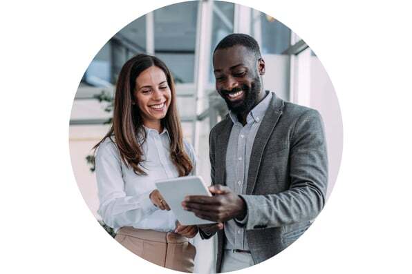 Man and woman looking at ipad Man and woman looking at ipad