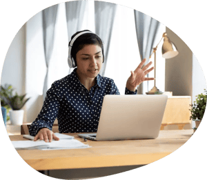 a person wearing headphones and using a laptop a person wearing headphones and using a laptop