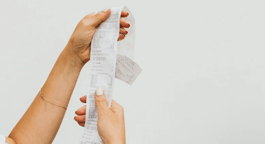 person holding a receipt