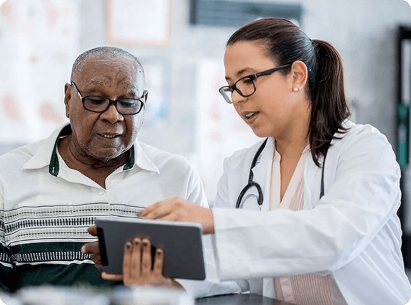 Doctor and elderly male patient - cropped