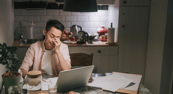 Man looking concerned while using phone