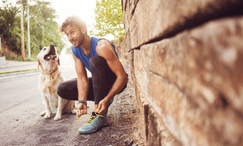 Man going for a run with dog