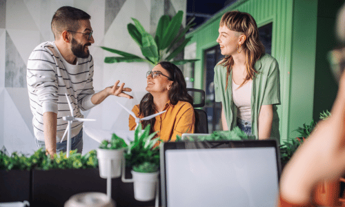 Office co-workers having a positive discussion