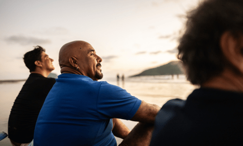 Senior man contemplating looking away on the beach