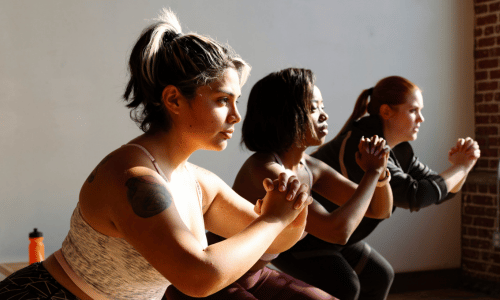 Three woman exercising indoors