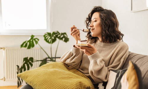 Woman eating cake